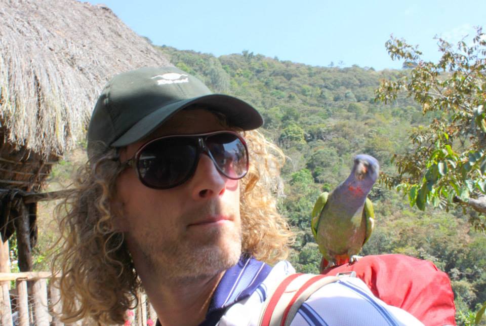 Making friends with a parrot in Peru